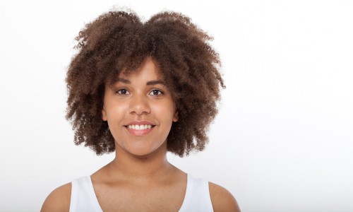 Picture of black woman with hygral fatigue Natural Hair